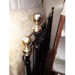 A Victorian brass and cast metal double bed frame.