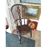 A 19th century elm Windsor chair.