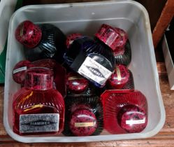 A box of ink bottles, various colours.