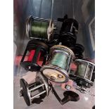 A selection of sea fishing reels.