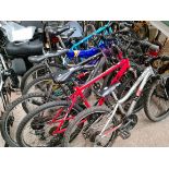 Six assorted children's bicycles.