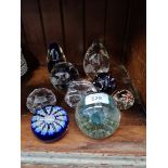 9 glass paperweights including Swedish, Liskeard, and millefiori examples