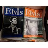 A box of Elvis Monthly magazines.