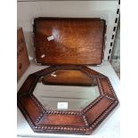 Octagonal oak framed mirror and an oak tray with mounrs