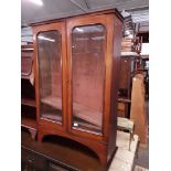 A Victorian mahogany glazed bookcase.