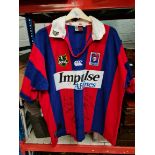 A circa 1998 National Rugby League Newcastle Knights jersey, with various signatures.