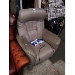 A Himolla leather electric reclining armchair.