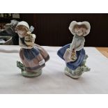 2 Lladro figures.