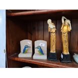 A pair of Art Deco bookends with kingfishers together with a pair of Art Deco style resin figurines.
