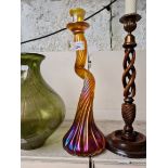 A John Ditchfield Glasform iridescent and twisted glass candlestick, height 35cm.
