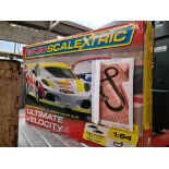 A Micro Scalextric set complete and working with two cars and accessories.