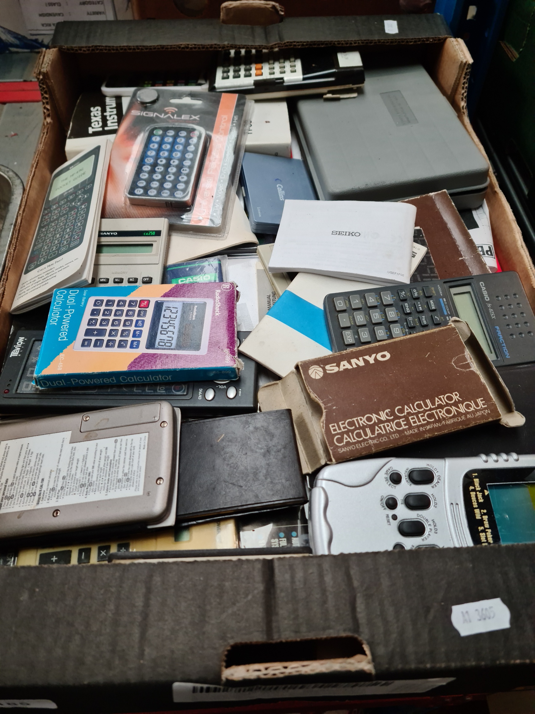A box of vintage calculators