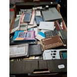 A box of vintage calculators