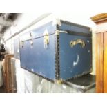 A vintage blue travel trunk by Mossman of London.