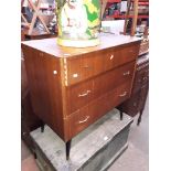 A mid 20th century teak chest of drawers.