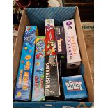 A box of board games including Vortex, Mastermind, Jenga etc.