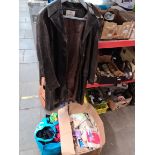 A box and a bag of clothing to include sport and leisure wear, and a ladies leather coat, size 16