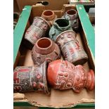 A box of 8 South American vases