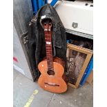 A Banus & Ibanez acoustic guitar - AF and a jacket.