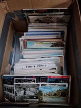 A box of vintage postcards