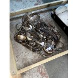 A tray of assorted silver plated ware.