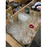 A box of mixed glassware including cut crystal glasses.