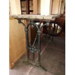 A table with cast metal base.