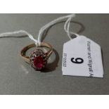 A hallmarked 9ct gold synthetic ruby cluster ring, gross wt. 2.3g, size M.