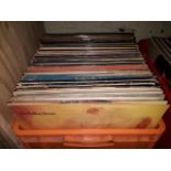 A box of records to include Thin Lizzy, The Beatles, Bowie, Status Quo, The Police, Judas Priest and