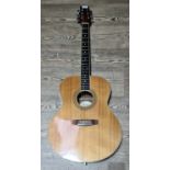 A Samick LJ020GA steel strung acoustic guitar.