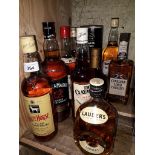 A selection of 10 bottles of whisky to include White Horse, Lauder's, The Claymore, Whyte &