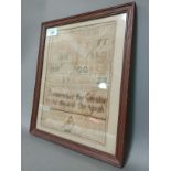 An antique religious sampler "Remember thy Creator in the days of thy youth" - from Ecclesiastes