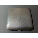 A hallmarked silver compact, Birmingham, Marion & Co, 1937, gross weight 84.3 grams.