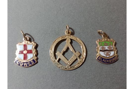 A group of 3 gold fobs / pendants to include a Masonic, marked 9ct, gross weight 4.35 grams.