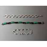 A hallmarked silver bracelet with black onyx and malachite stones together with two other silver