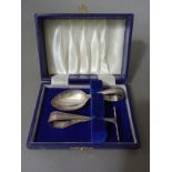 A hallmarked silver spoon and pusher in associated box, Birmingham, David Shaw Silverware Ltd, 1989.