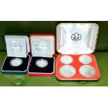 Two Royal Mint silver proof £2 coins (1994,1995) boxed with certificates and a Montreal olympics