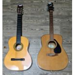 A Yamaha F-340 steel strung acoustic guitar and a Stagg C542nylon strung guitar.