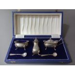 A hallmarked silver set of condiments in associated box, Birmingham, Laurence R Watson & Co, 1980,
