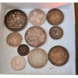 A group of silver coins to include a 1723 shilling & a Victorian crown etc.