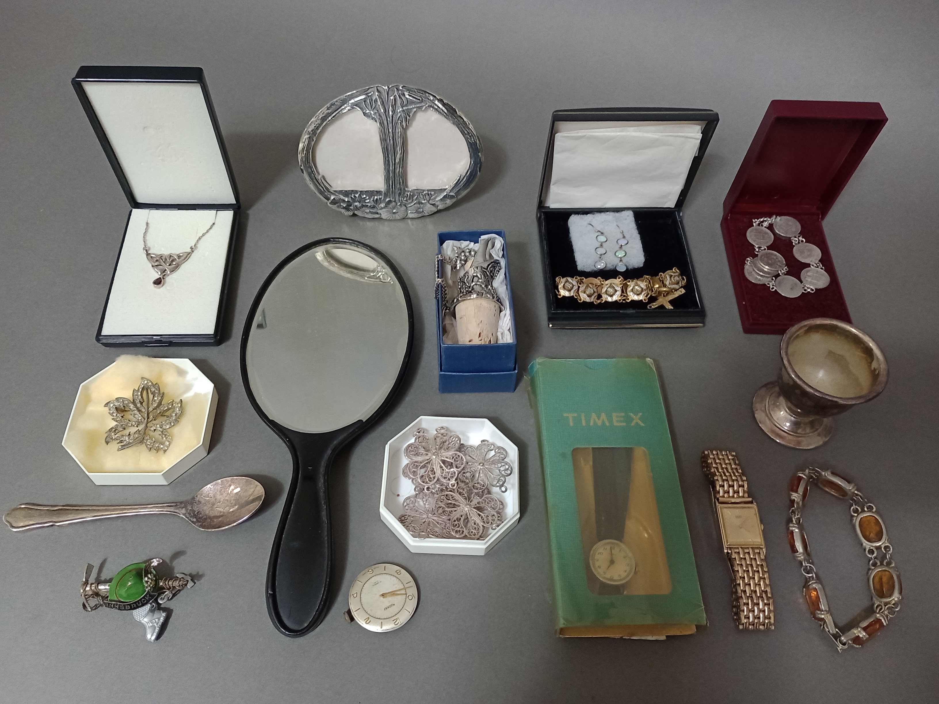 A mixed lot of jewellery, a rolled gold watch, silver plated, mountaineering brooch, etc.