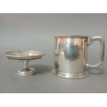 A hallmarked silver mug, Birmingham, William Neale & Son Ltd, 1930 together with a hallmarked silver