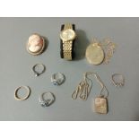 A mixed lot of jewellery including a shell cameo brooch, yellow metal, jewellery marked 'Silver' a