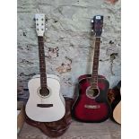 Two accoustic guitars, one by Rikter and the other by Stretton Payne.