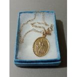 A hallmarked 9ct gold St Christopher medallion on chain marked '9K', gross wt. 4.2g.