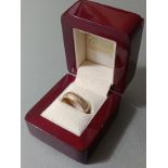 A 9ct gold wedding band, wt. 5.3g, size R.