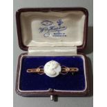 A Victorian cameo brooch, marked '9ct', gross wt. 3.3g.