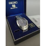 A circa 1981 Seiko 100m watch, with papers and box.