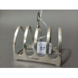 A hallmarked silver toast rack, Sheffield, Viner's Ltd (Emile Viner), 1933, gross weight 1.7 ozt.