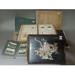 A collection of various old photograph albums including some world, travel, some family, etc and a